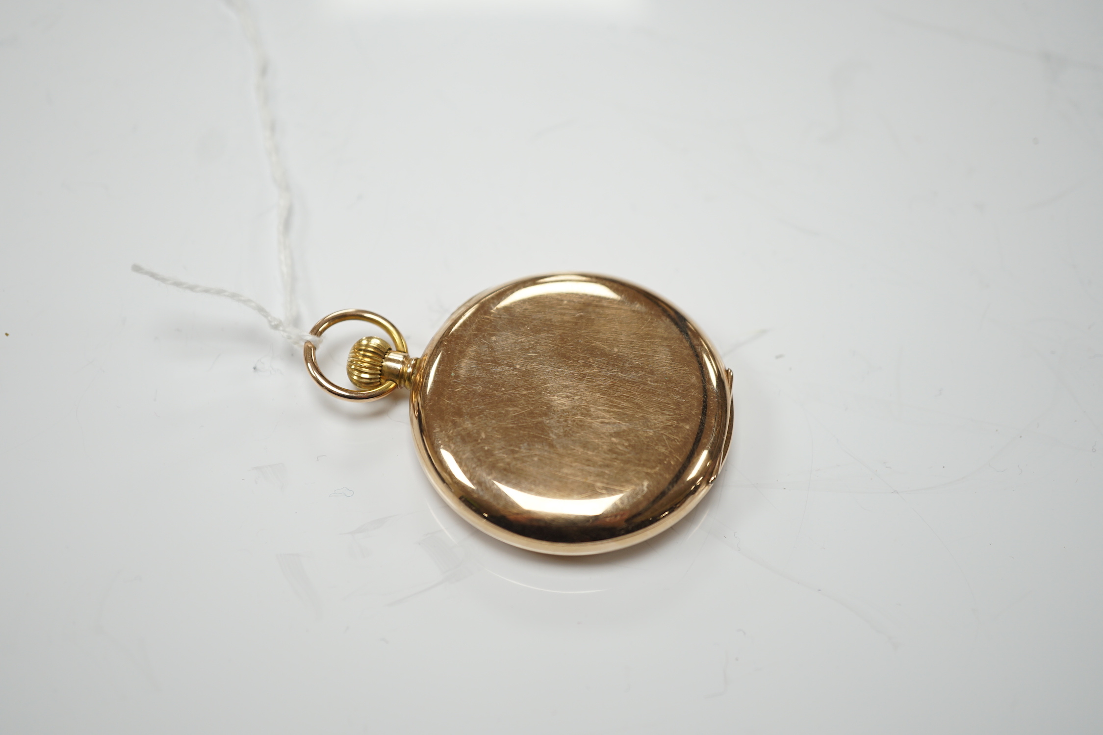 An early 20th century 9ct gold open face pocket watch, retailed by Spiegelhalter Bros, with Arabic dial and subsidiary seconds, case diameter 47mm, gross weight 61.2 grams.
